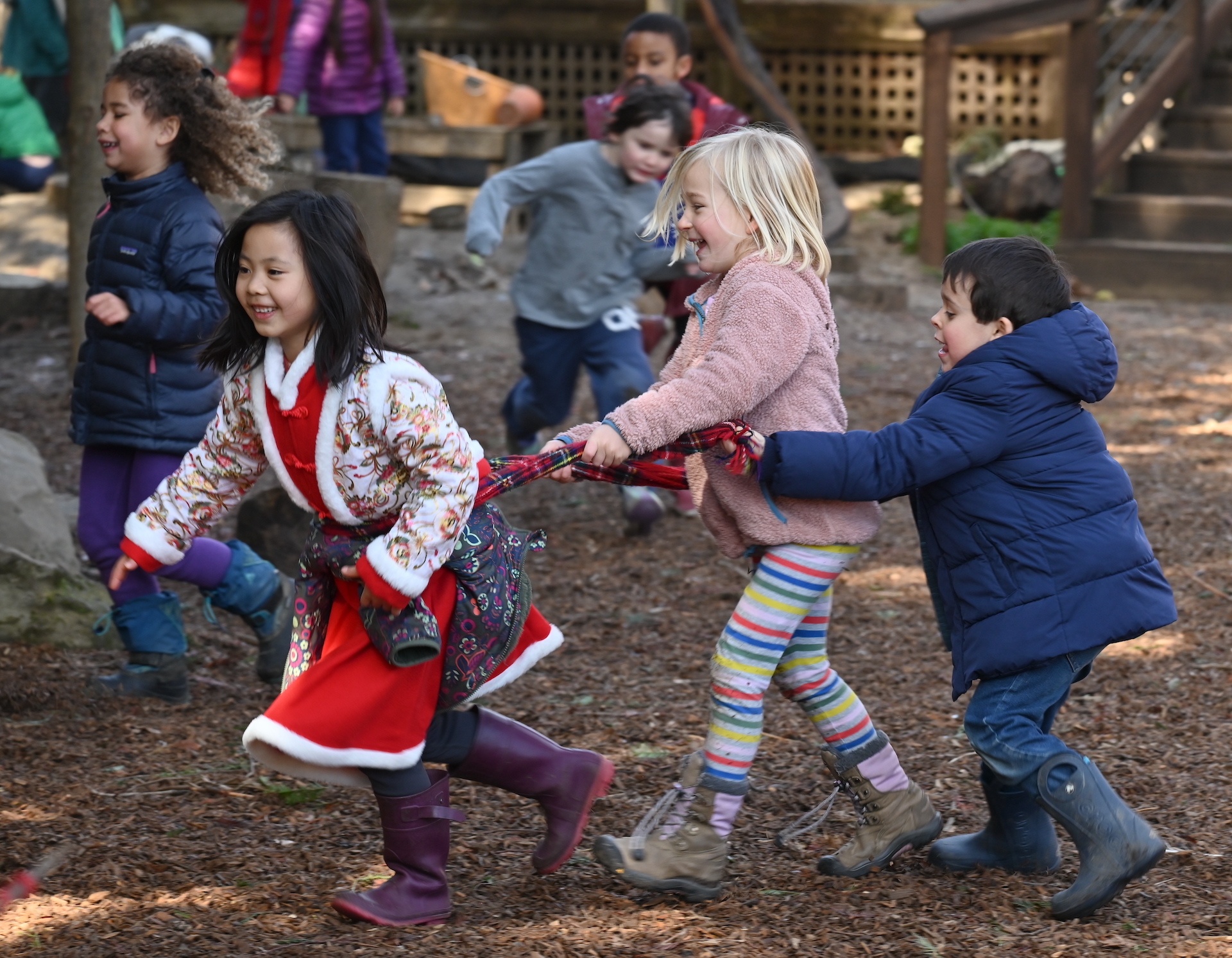 Smiling children playing outside